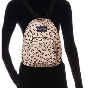 Jansport half pint backpack cheetah print black with beige